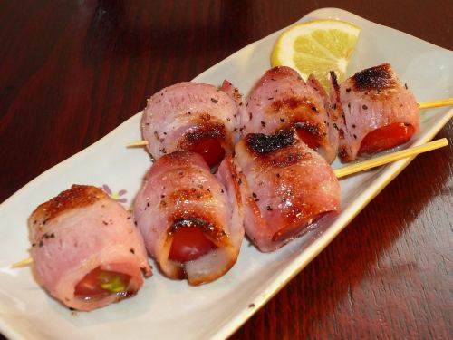 Petit tomato wrapped in bacon