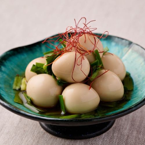 Quail eggs marinated in chives and soy sauce