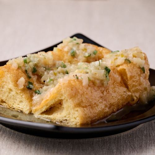 Tochioage topped with green onions and salt