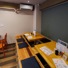 This room has seating for three.The table is made from a single piece of wood, giving it a warm atmosphere and giving off the warmth of the wood.