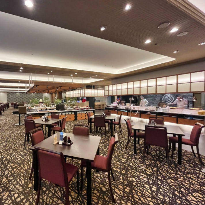 The spacious seating arrangement allows families to enjoy a leisurely meal together.