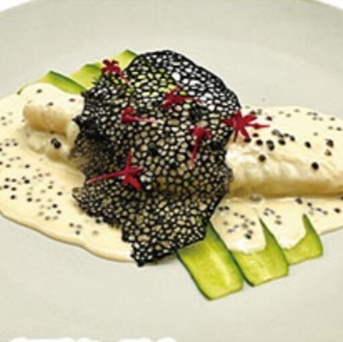 Steamed white fish with caviar sauce