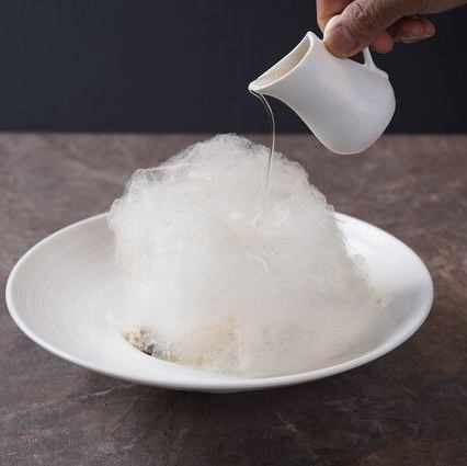 Rich chocolate gateau with cotton candy dome