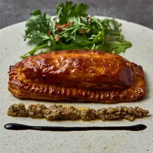 Pacific saury en croûte with tapenade sauce