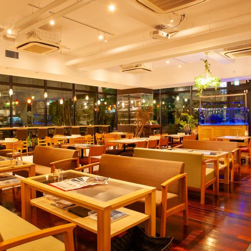 There are approximately 50 seats in total, including sofas, tables, and counters.