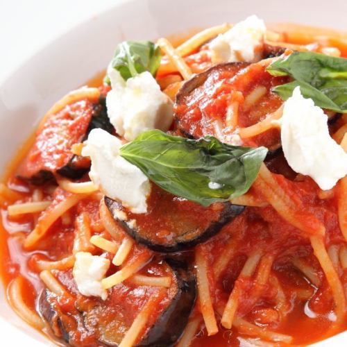 Eggplant and basil tomato sauce pasta with ricotta cheese