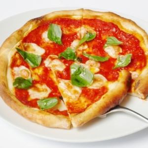 Pizza Margherita using the finest mozzarella cheese