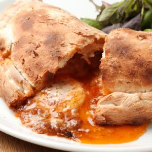 Calzone pizza made with homemade bolognese and the finest eggs from Kyoto Ohara Yamada Farm