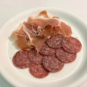 Platter of raw ham and salami