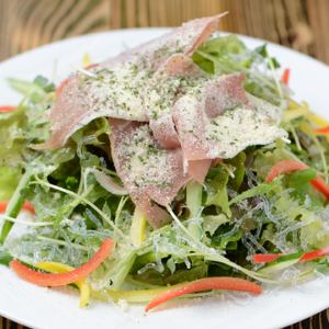 Warm egg Caesar salad with uncured ham