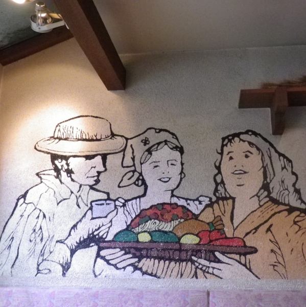 店内はヨーロッパの農家をイメージした内装。壁には大地の恵みを抱えた農姉たちが笑顔で出迎えてくれる。