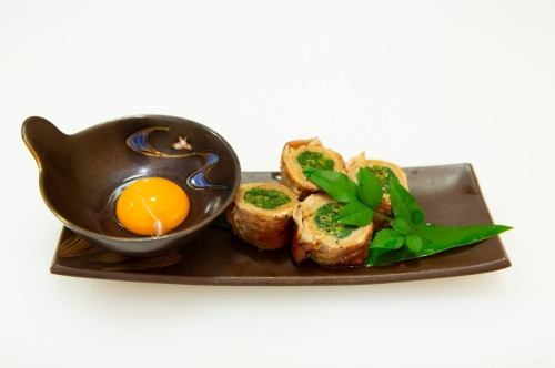 ねぎ豚巻きのたれ焼き　卵黄添え