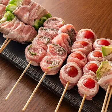 Our specialty! Try our Hakata vegetable wrapped skewers!
