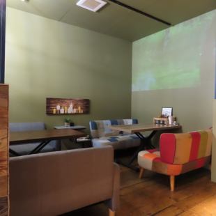 Sofa seats with a projector and picture books are perfect for children