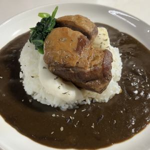 Black curry with chunks of pork
